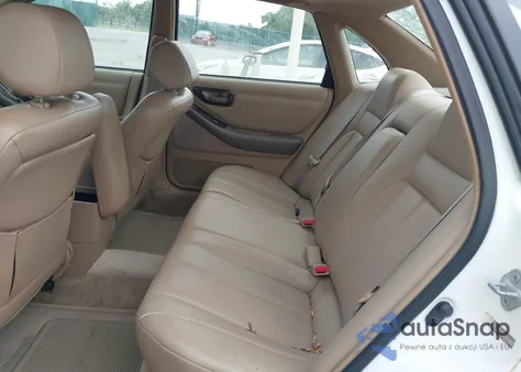 1997 Toyota Avalon Xl z USA, uszkodzony, nr VIN 4T1BF12B8VU168623